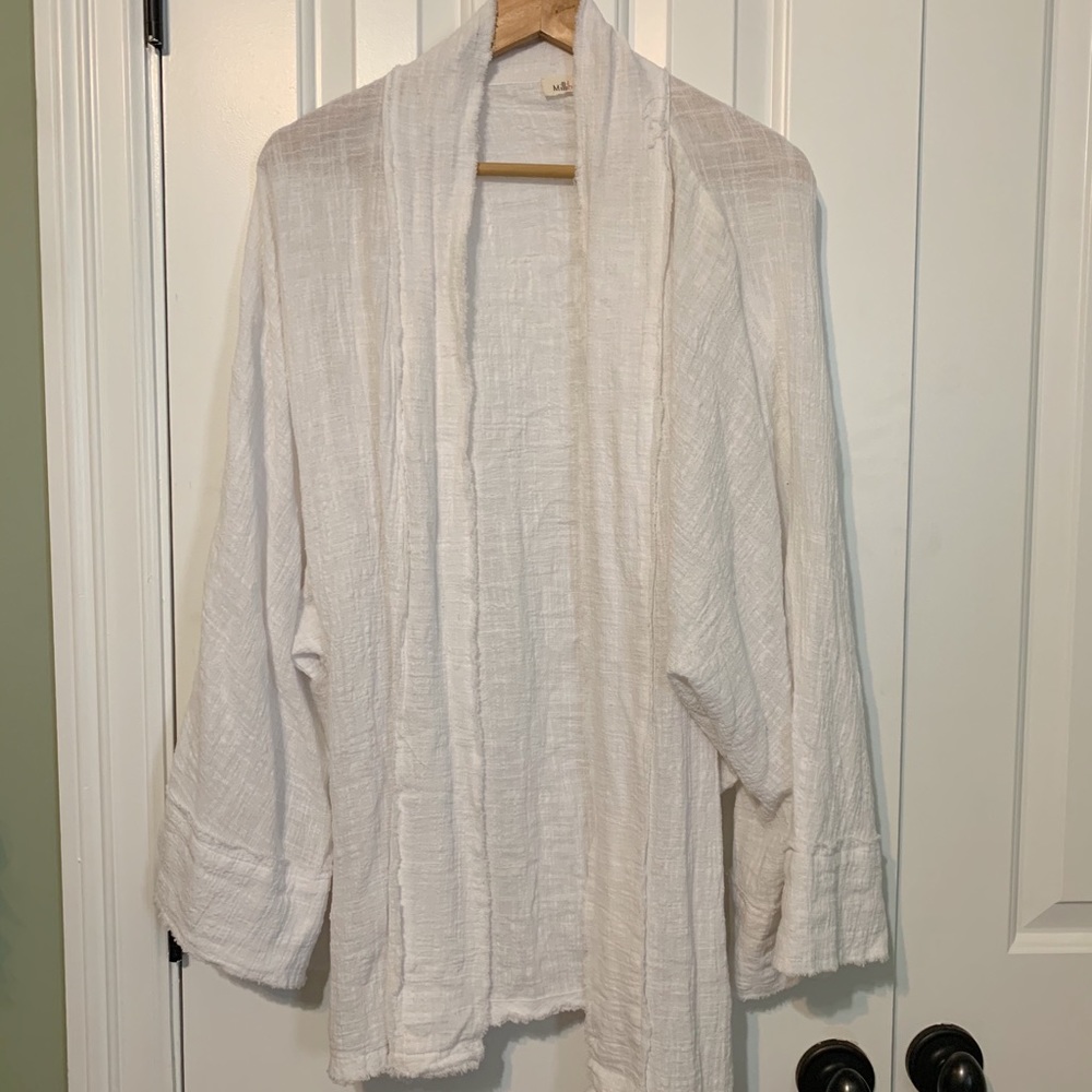 White swimsuit cover up